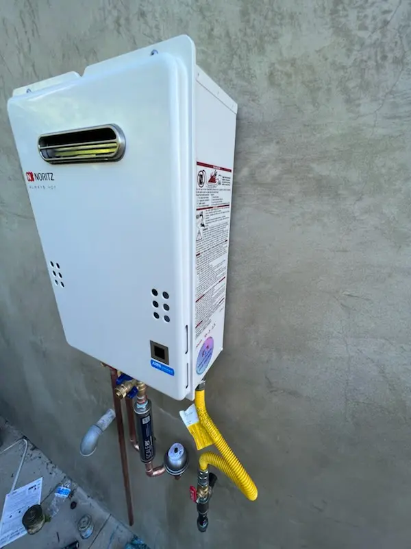 Tankless water heater installation for Adventure Town Center homes