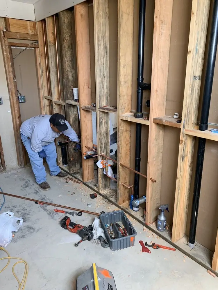 Commercial rough-in plumbing for Water Heater Replacement in Adventure Town Center